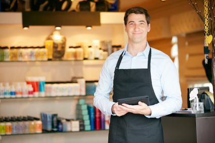 Portrait Of Male Sales Assistant In Beauty Product Shop