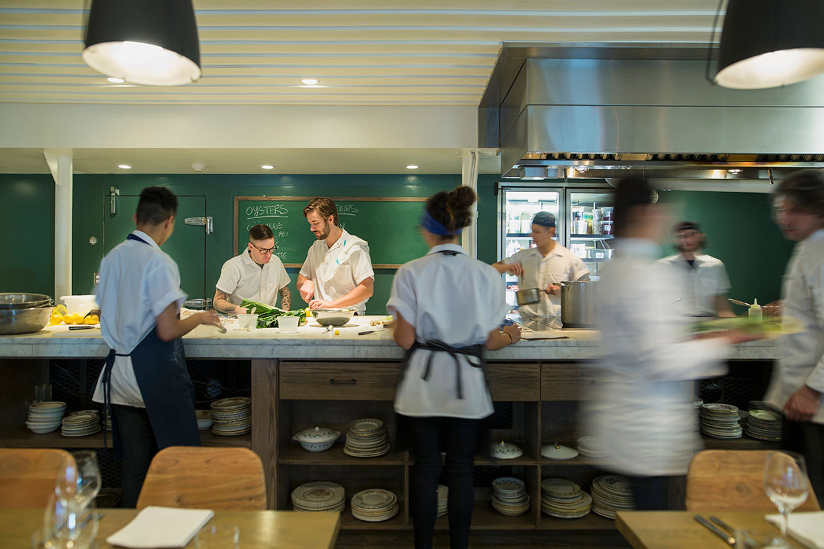 A group of chefs in a kitchen