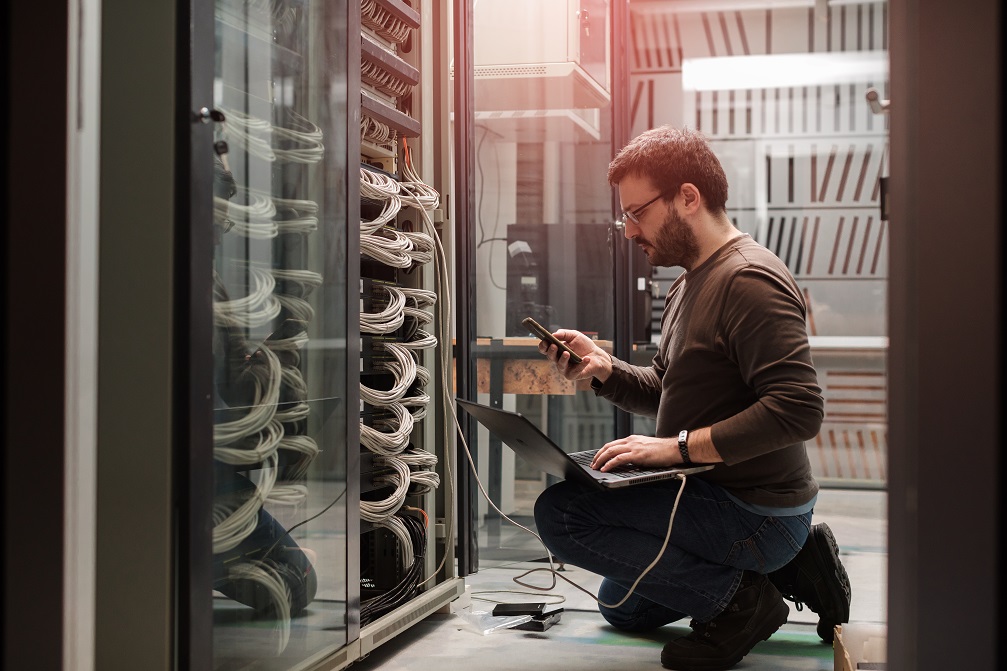 a man performing hardware maintenance services