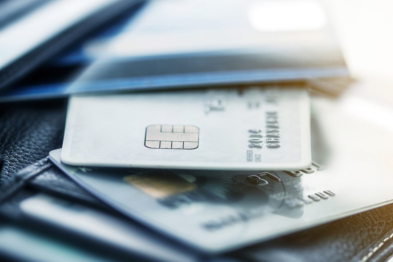 a close-up of a pile of payment cards